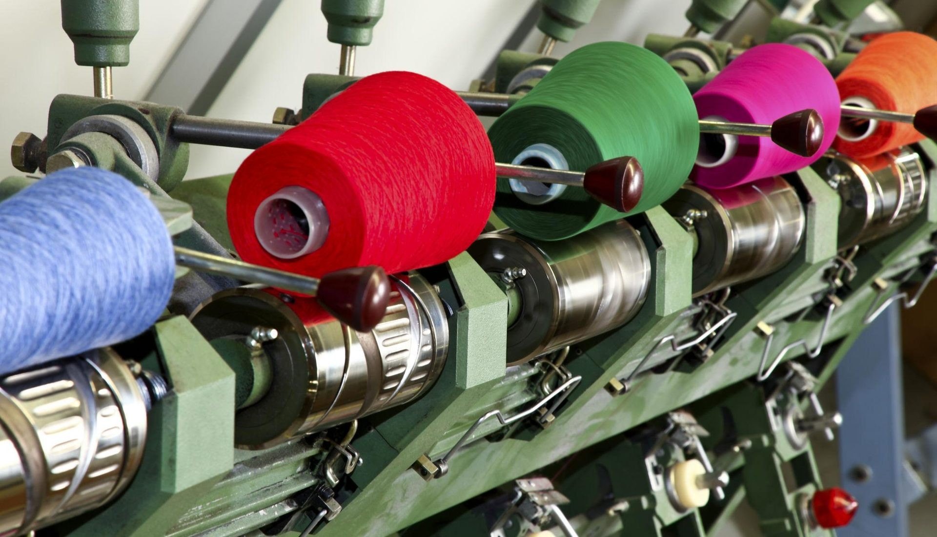 Yarn being spun on the mill floor at Jindal Yarns, Panipat